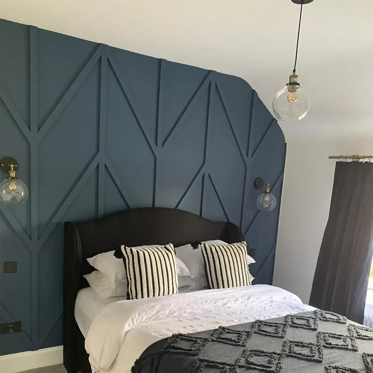 Slimline MDF panelling strips installed in a contemporary room setting