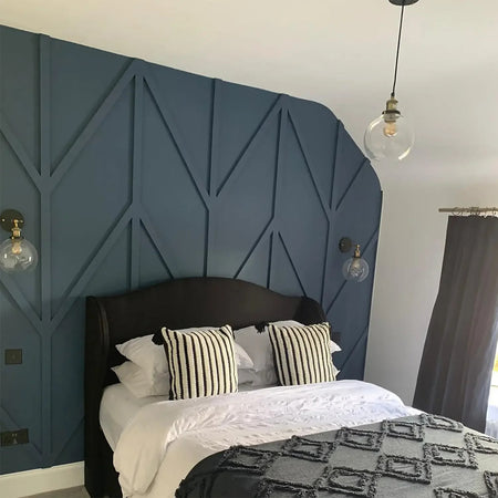 Slimline MDF panelling strips installed in a contemporary room setting