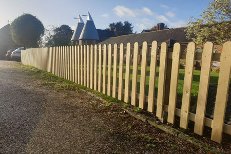 Hutton picket fence panels in pressure treated softwood with pointed-top pales