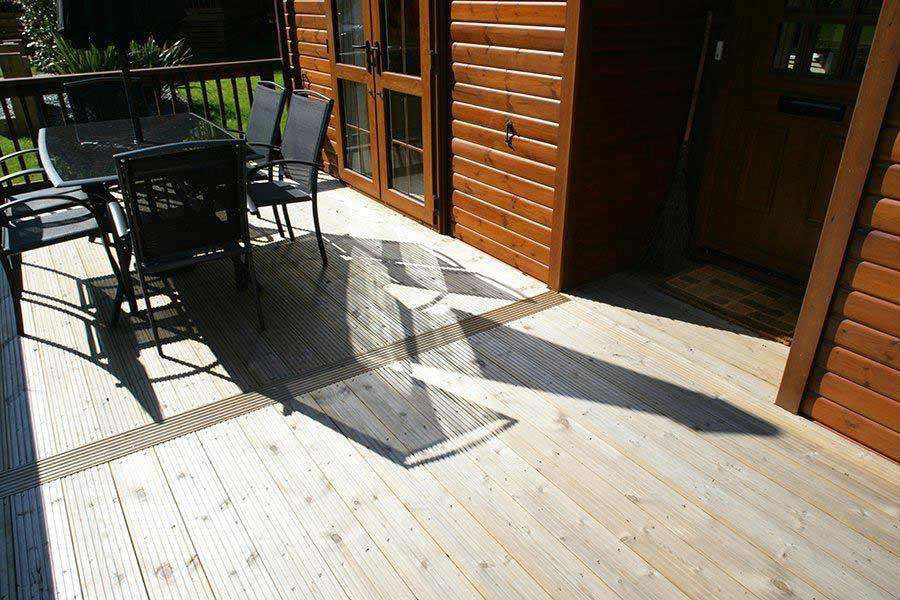 Premium Treated Grooved & Smooth Decking Boards - 32mm x 125mm Nottage Timber Merchants