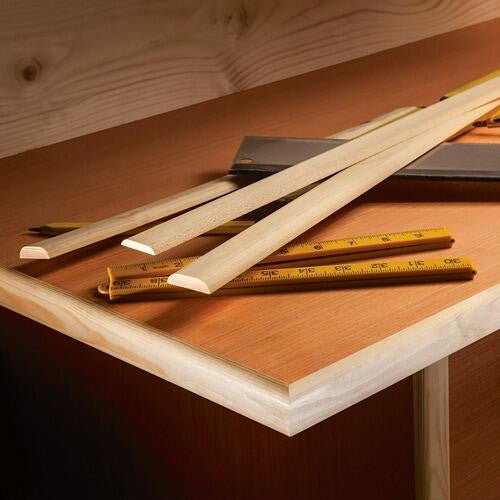 Oak cover mouldings used as decorative finish on interior joinery