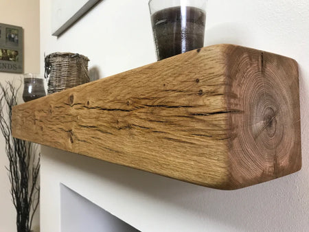 Solid rustic oak fireplace mantel shelf showing natural knots and grain, planed smooth finish